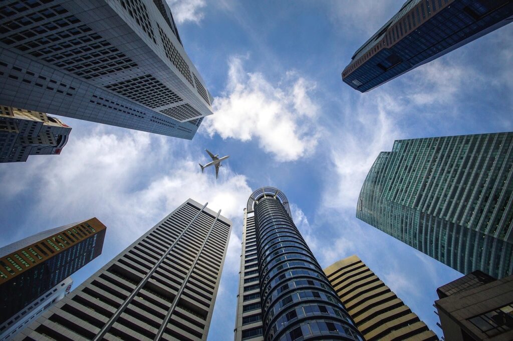 High-rise apartment buildings in Orange County, Los Angeles and San Diego, California served by Easy Toss Valet Trash service convenient doorstep waste pickup by a professional waste management company."